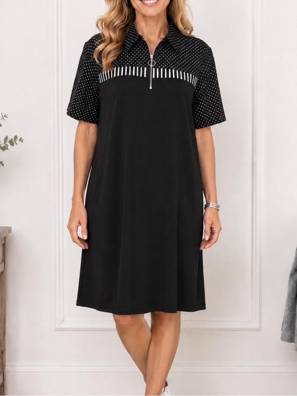 Appleseed’s Dress,Solid black body with a relaxed, slightly A-line silhouette